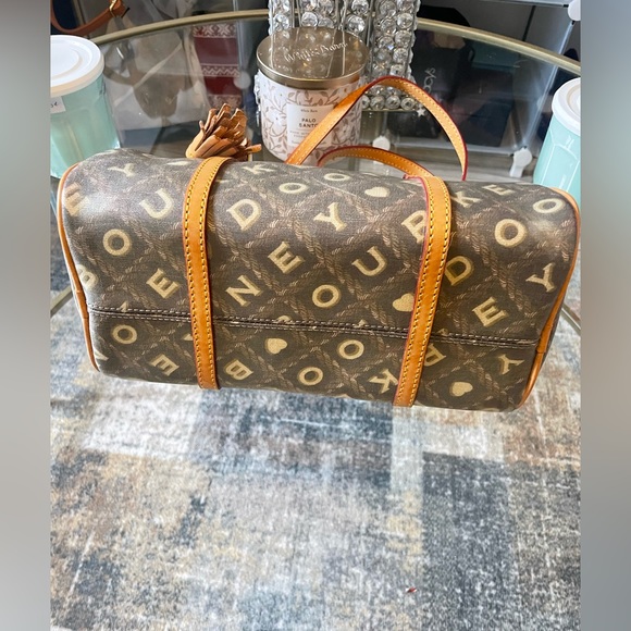Dooney & Bourke (rare!!)
Barrel Brown/Tan/Cream Color Writing (Coffee) duffle - Picture 6 of 10
